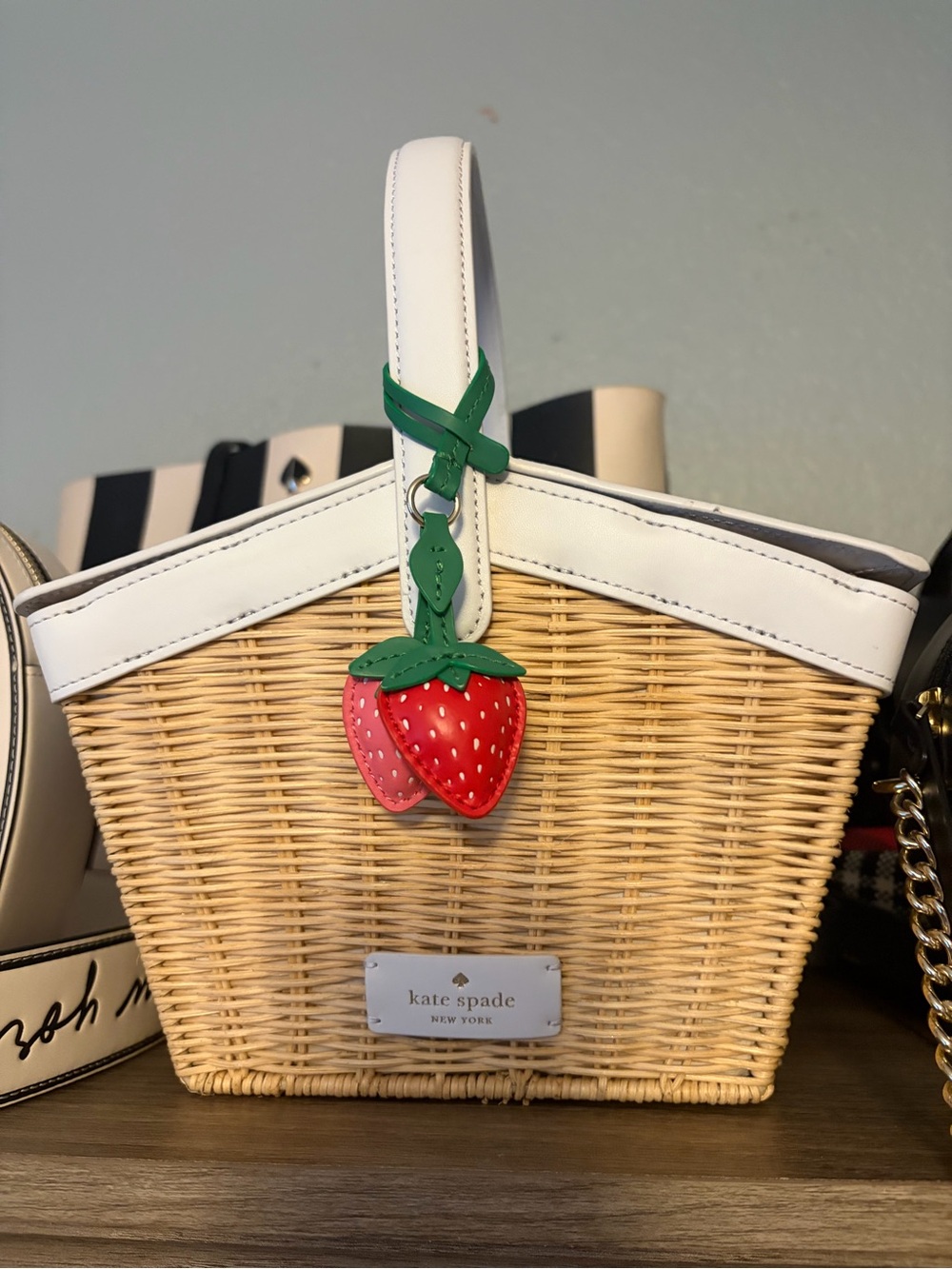 kate spade Straw Crossbody Tote with White Trim and Strawberry Charm